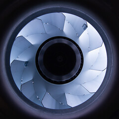 exhaust fan impeller opens up, front and back background blurred with bokeh effect