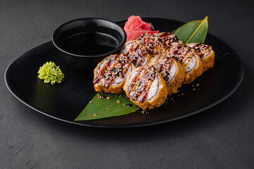 Warm sushi roll with unagi sauce