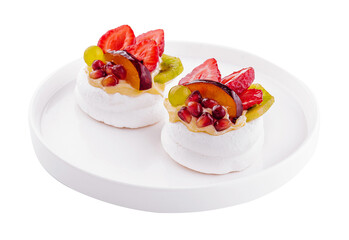 Mini pavlovas with whipped cream and fresh fruit