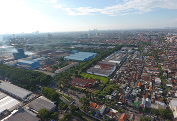 An aerial photo depicting a dense residential area in the city of Surabaya, Indonesia