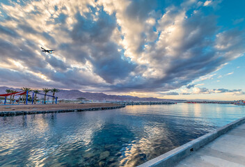 Fototapeta na wymiar Marina of the Red Sea at dawn in Eilat - famous tourist resort city in Israel