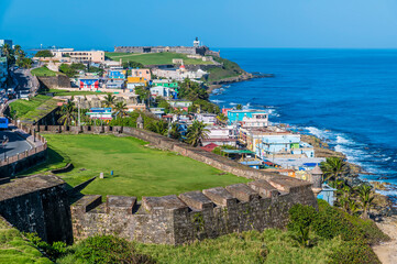 Fototapeta na wymiar A view west over the battlements of the Castle of San Cristobal in San Juan, Puerto Rico on a bright sunny day