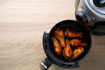 Cooking drummet chicken with Fish Sauce in Air Fryer pot