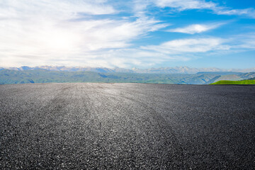 Asphalt road with green mountain nature background