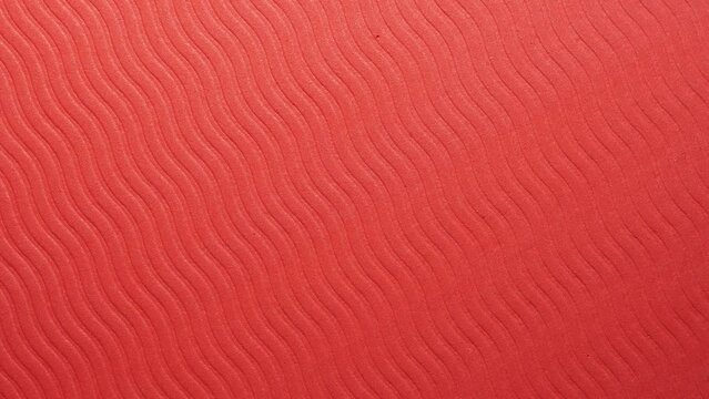 Geometric shapes pattern. Close-up of a black corrugated surface circular rotation.
Seamless loop.