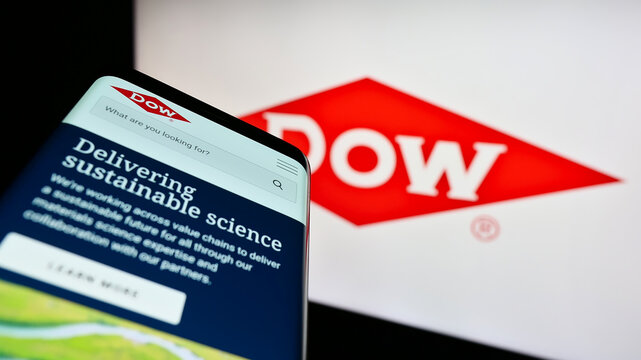 Stuttgart, Germany - 01-27-2023: Smartphone with website of US chemical company Dow Inc. on screen in front of business logo. Focus on center of phone display.