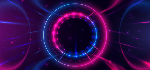 Abstract technology futuristic neon circle glowing blue and pink  light lines with speed motion blur effect on dark blue background.
