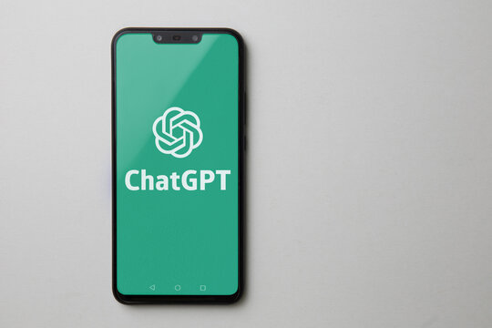 Smartphone showing ChatGPT logo on white background
