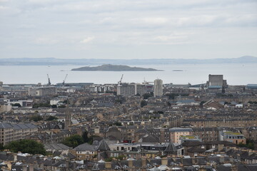 Aerial view of Edinburgh city centre with buildings and landmarks. 