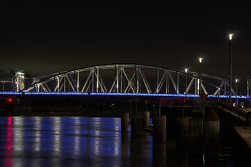 Bridge over the river the Ijssel at night near the center of Zutphen in the Netherlands. The bridge is called Oude Ijsselbrug