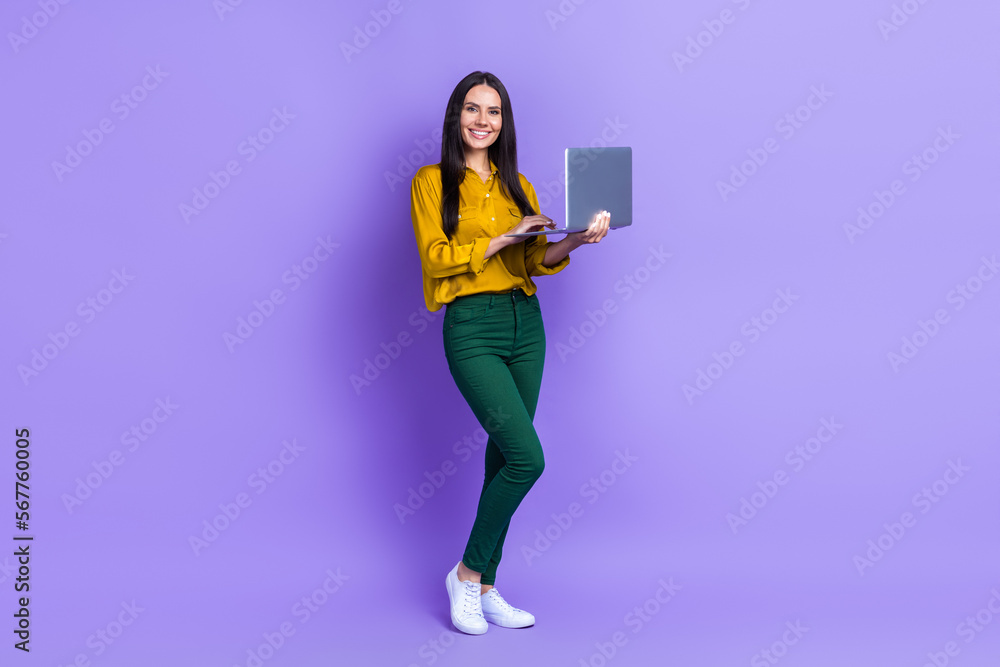 Sticker Full size photo of pretty cheerful girl hold use wireless netbook coworking isolated on violet color background