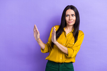 Photo of funny successful lady wear trendy clothes look empty space avoid suspicious proposition offer isolated on purple color background