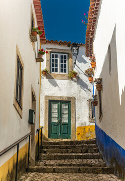 Streets of beautiful medieval village Obidos in centre of Portugal