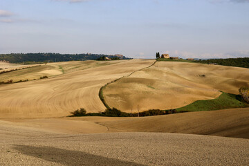 Fototapeta na wymiar Plowed fields in Tuscany, Italy. Autumn in October. 