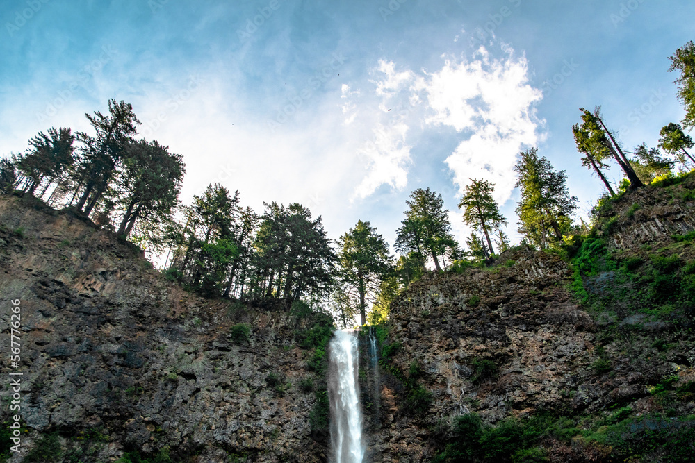 Wall mural ridegeline silhouettes at the top of multnomah falls in portland, or