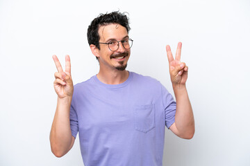 Young man with moustache isolated on white background showing victory sign with both hands