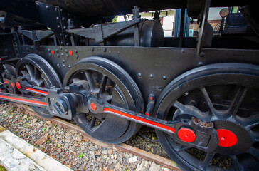 Old train locomotive wheel, collection of Ambarawa railway museum located in Ambarawa, Semarang, Indonesia.
