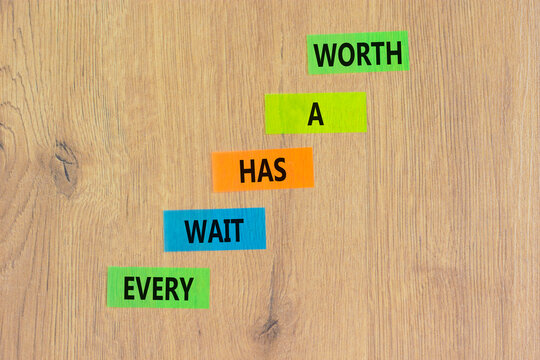 Every wait has a worth symbol. Concept words Every wait has a worth on colored paper. Beautiful wooden table wooden background. Business Every wait has a worth concept. Copy space.