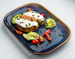 Fried zucchini pancakes with cream cheese