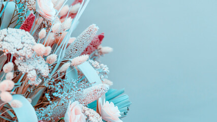 A modern bouquet of dried and preserved flowers dominated by turquoise colours. - 567788494