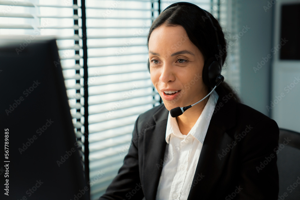 Aufkleber competent female operator working on computer and talking with clients. concept relevant to both cal