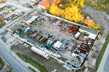 Industrial area of the city from above. Many containers, garbage recycling, metal collection