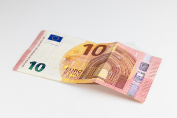 10 euro banknote on a white background, rumpled banknote