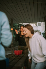 Fototapeta premium Friends playing beer pong