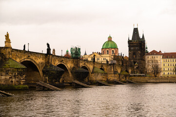 Fototapeta na wymiar Charles Bridge over the River Vltava in Prague, Czech Republic in the Morning