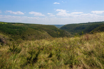 Obraz premium The hilly nature of Eastern Europe. Background with copy space for text, toned