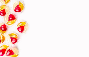 capsules with colored gel for washing on a white background copy space