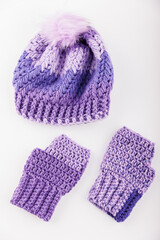purple ice cap and gloves in white background