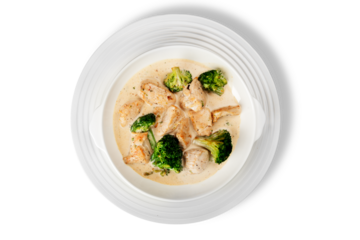 Lamb and sweet potato peanut stew served with white rice. Caribbean and West African dish