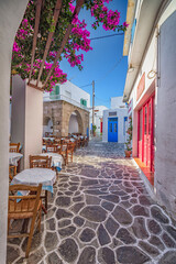 A characteristic alley with taverna in Plaka village, Milos island GR