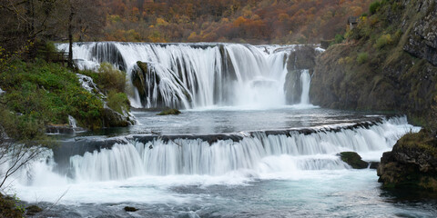 Štrbački buk waterfall on Una river in Una national park, Bosnia and Herzegovina, waterfall on mountain river in autumn