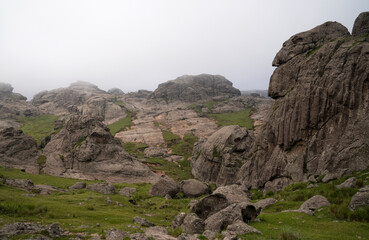 View of The Giants rock massif in Cordoba, Argentina, in a foggy morning.