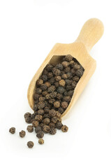 Heap of black pepper, peppercorns in spoon isolated on white background, dried spice peppercorn concept