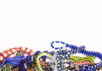 Bead jewelery on white background.