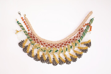 Bead jewelery on white background.