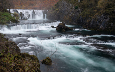 Fototapeta premium Štrbački buk waterfall on Una river in Bosnia and Herzegovina, mountain river in National park Una
