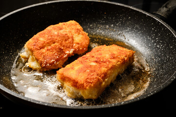 Frying breaded fish
