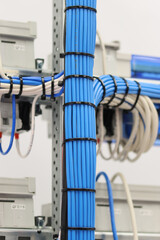 Plastic ties for mounting electrical wires in the control panel close-up.