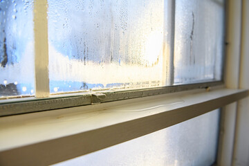 The Condensation water on window glass on the inside of the house