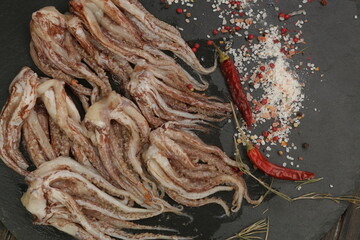 raw squid tentacles background close up photo © ulianna19970