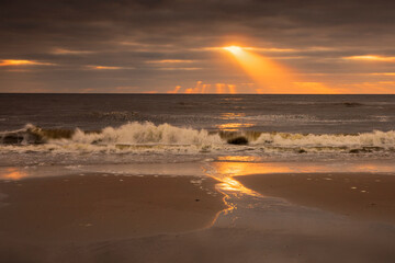 sunset on North sea beach - obrazy, fototapety, plakaty