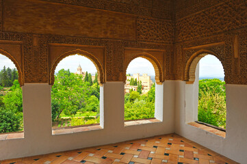 The Alhambra in Granada from the arab gazebo of the Generalife Palace, Andalusia, Spain. UNESCO World Heritage Site