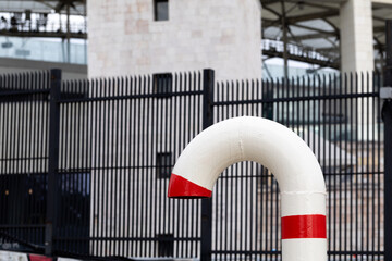 White pipes with red stripes. Pipes look like candy sticks.