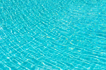Fototapeta na wymiar photo of turquoise summer pool water background. summer pool water background.