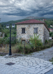 Street and houses in Zarouhla village in Greece. Aroania mountain villages, Peloponnese, Greece