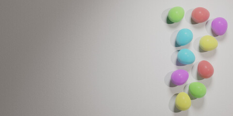 Colored easter eggs on white textured surface.